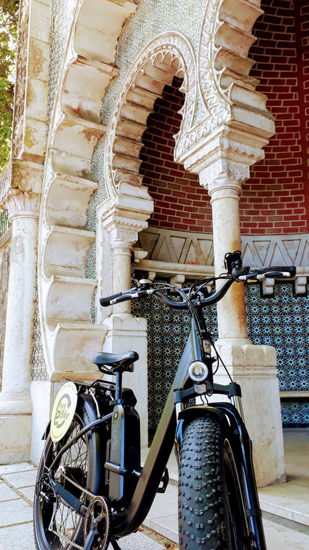 Fat tire ebike in Sintra in front of a pretty old fountain
